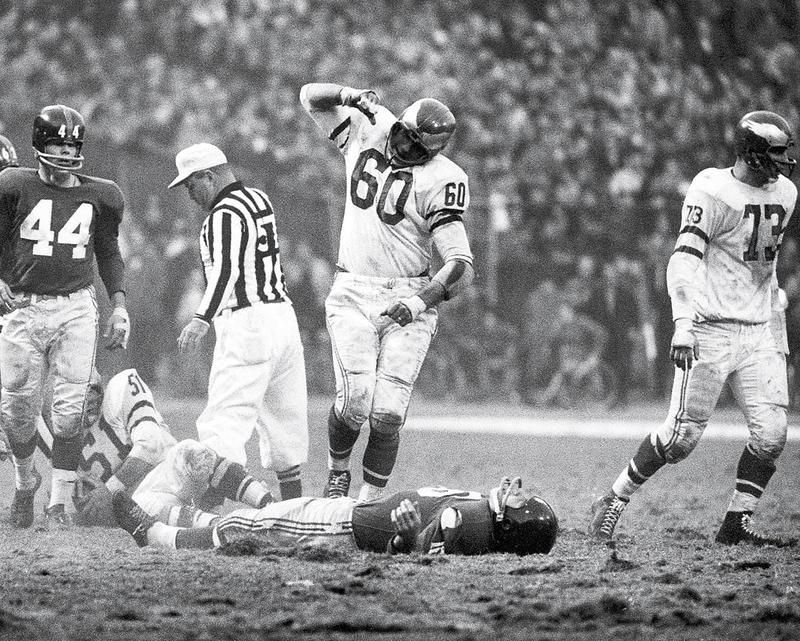 Chuck Bednarik and Frank Gifford