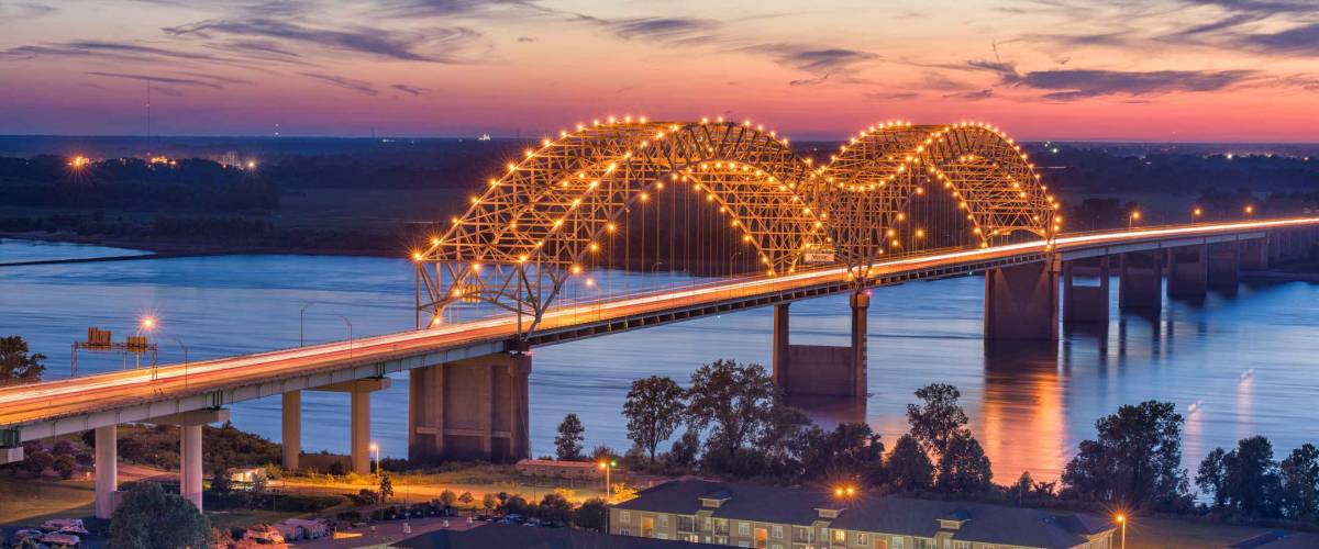 Memphis, Tennessee, USA at Hernando de Soto Bridge at dusk.