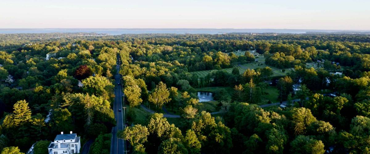 aerial drone shot over by North Street in Greenwich, Connecticut, looking towards the Long Island Sound